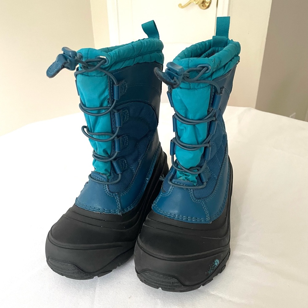 The North Face black and blue winter boots